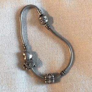 authentic Pandora bracelet with 3 charms